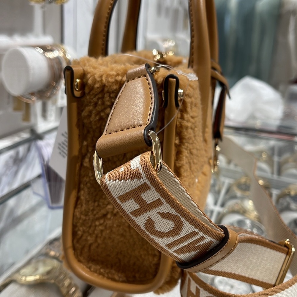 Michael Kors Mirella Extra-Small Sherpa XS SHOPPER XBODY
SHEARLING Crossbody - Picture 13 of 16
